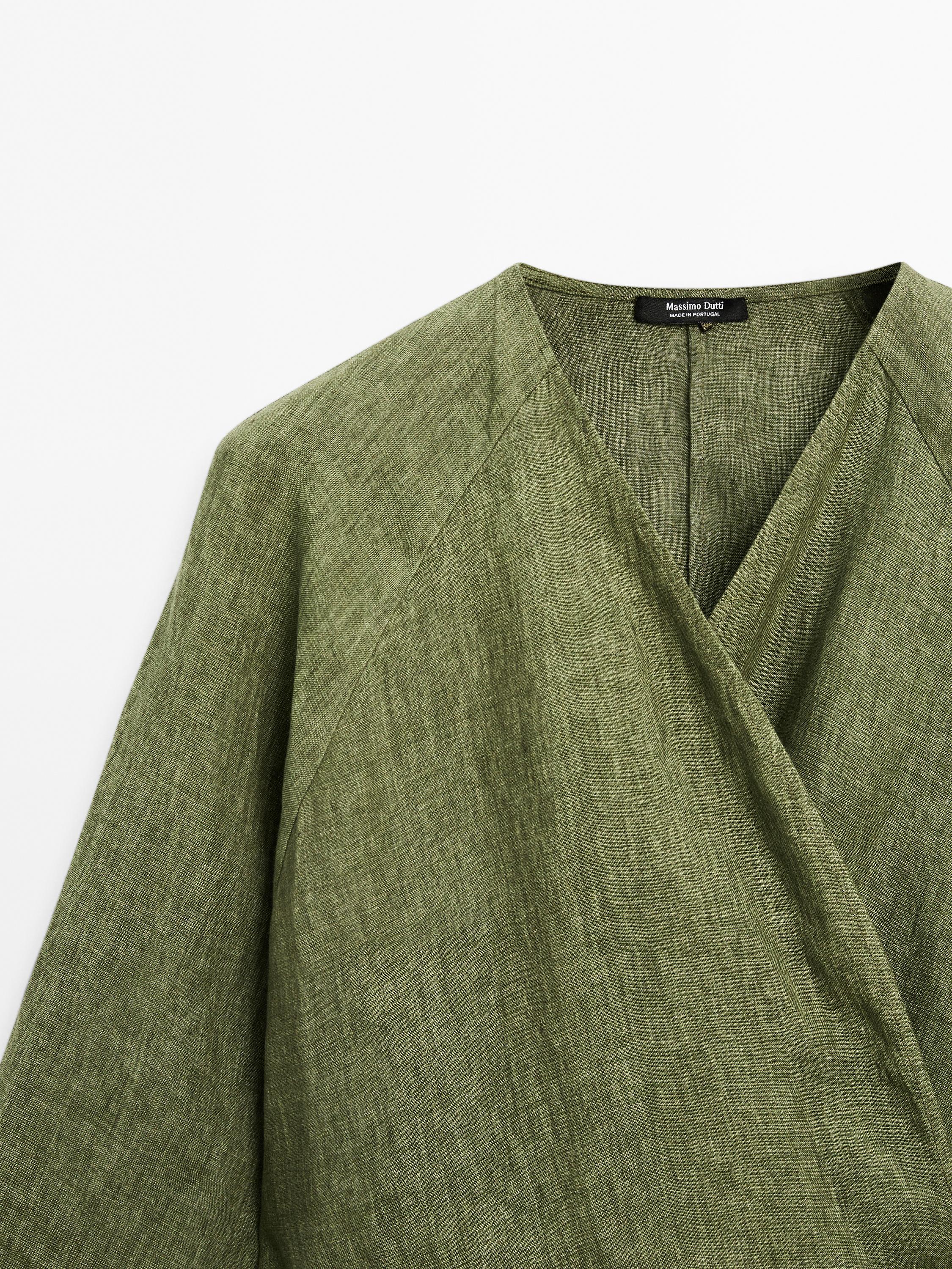 Flowing linen blouse with tie detail at the waist